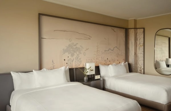 Chambre double de l'hôtel The Park Lane avec une décoration sobre et décoration épurée